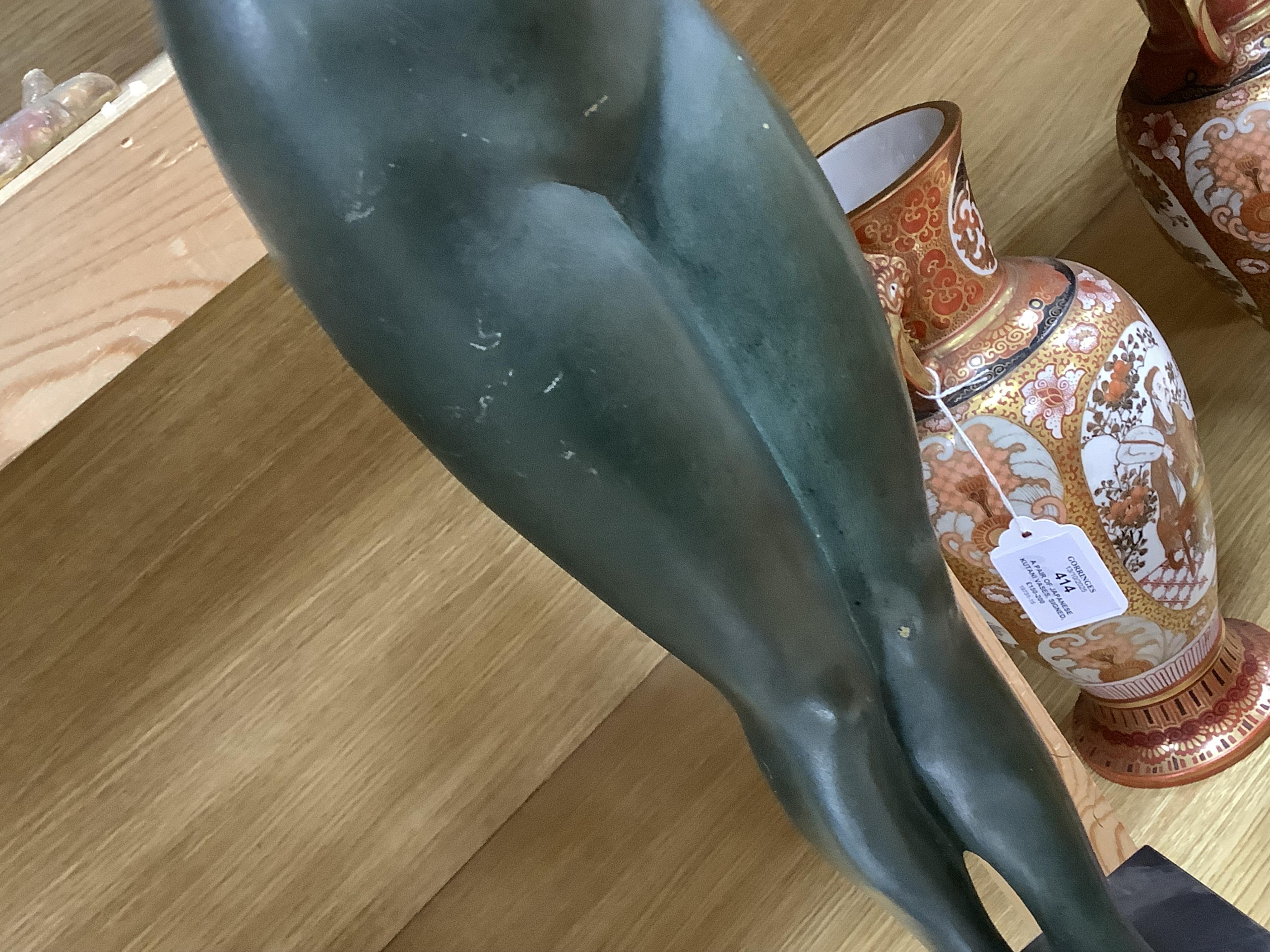Segundo, a bronze nude female, on marble plinth, 47cm wide, 67cm high